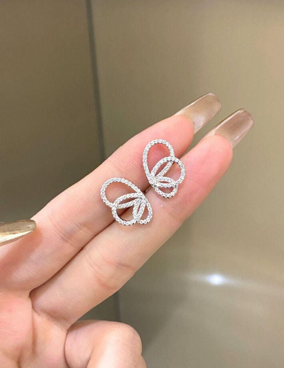 Broqueles Andrea de plata P 925 con acabado baño rodio zirconia 2